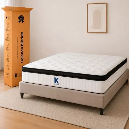 Colchón de dos plazas con pillow top sobre una cama en un dormitorio
