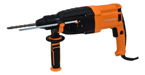 Taladro percutor con sistema SDS Plus perforando una pared